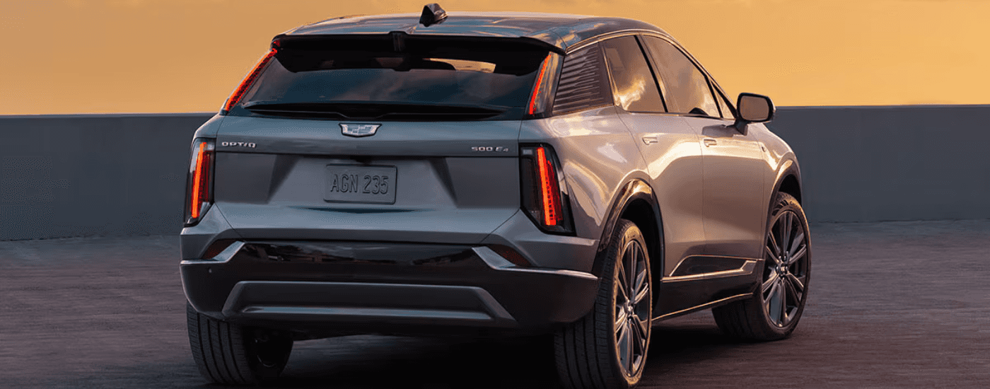 Silver 2026 Cadillac OPTIQ from the rear