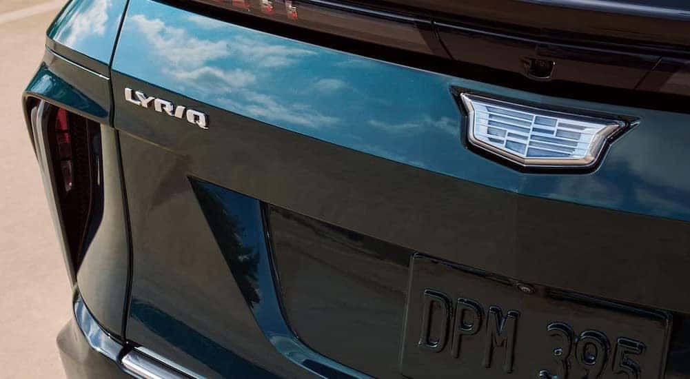 Close-up of the Badges on a green 2026 Cadillac LYRIQ.