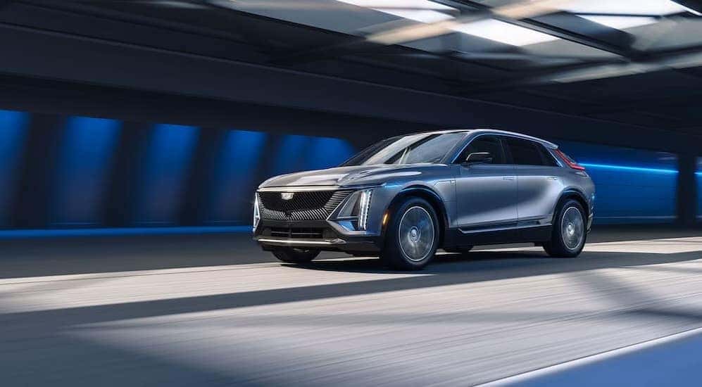 A silver 2026 Cadillac LYRIQ driving in a tunnel.