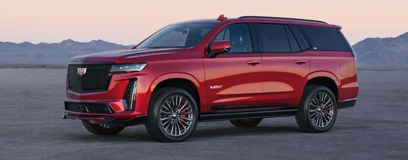 Red 2023 Cadillac Escalade V parked at an angle