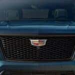 Close-up of the front end of a blue 2026 Cadillac Escalade for sale near Sandy Springs.