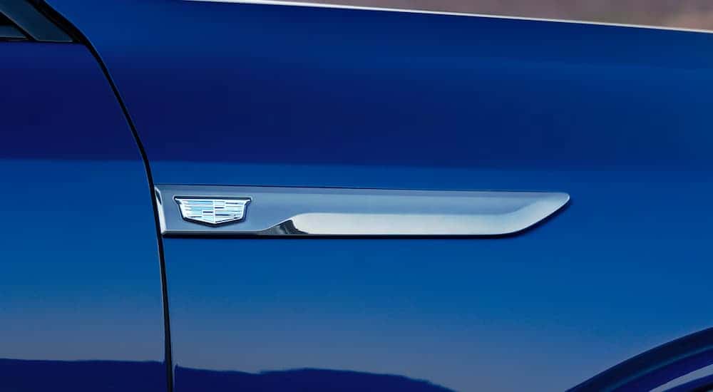 Door panel details on a blue 2026 Cadillac VISTIQ