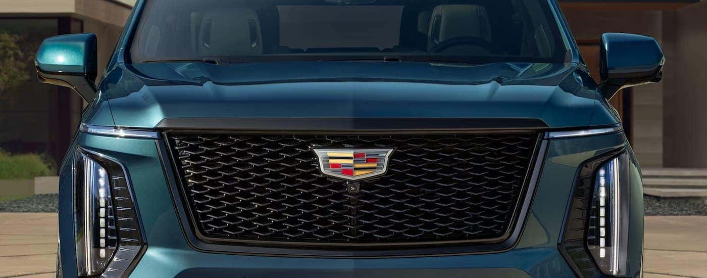 Front grille on a blue 2026 Cadillac Escalade