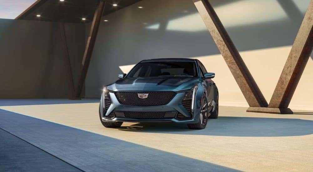 Blue 2026 Cadillac CT5 shown parked at an angle.