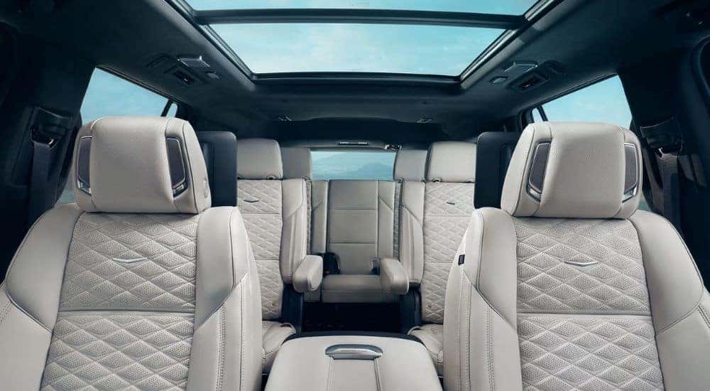Interior view of a 2026 Cadillac Escalade with light gray seats.