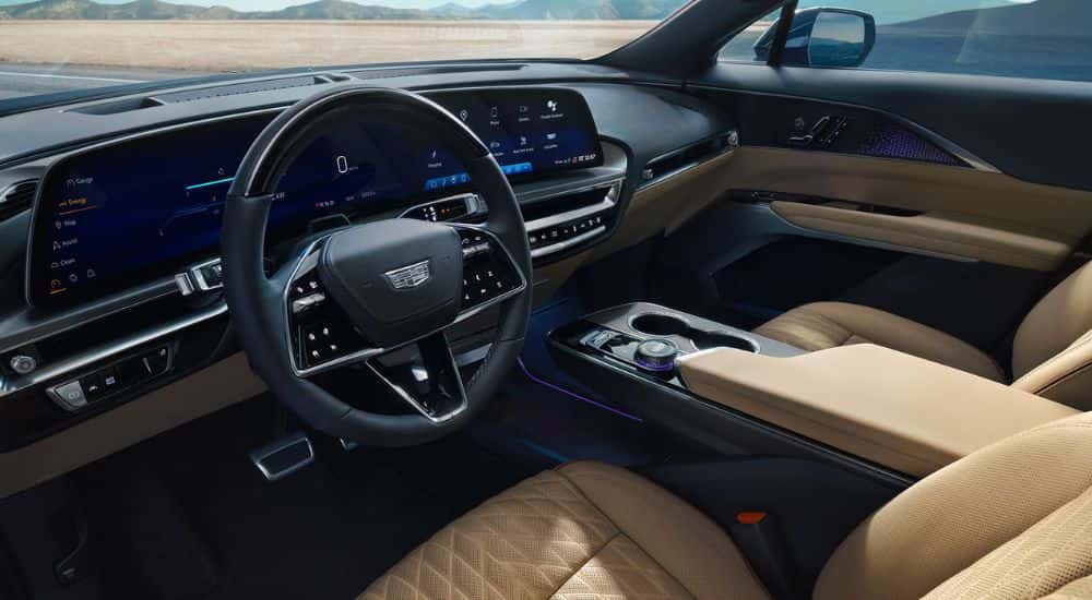 The tan front interior of a 2026 Cadillac LYRIQ.