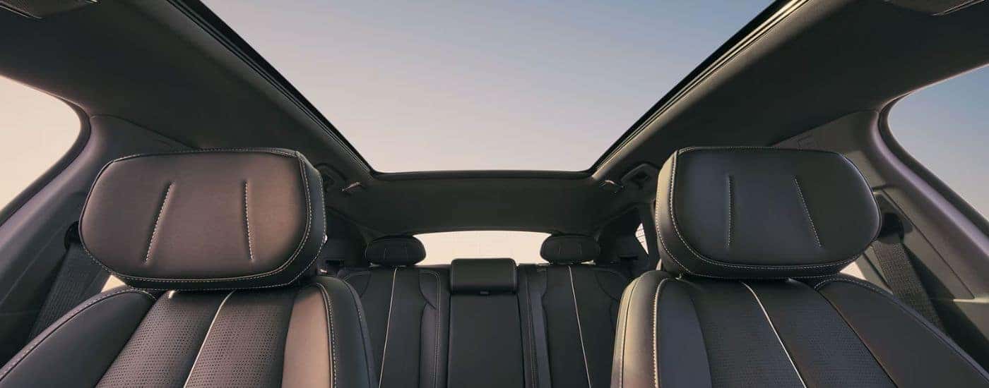 Black seats and Skyglass roof on a 2027 Cadillac OPTIQ.