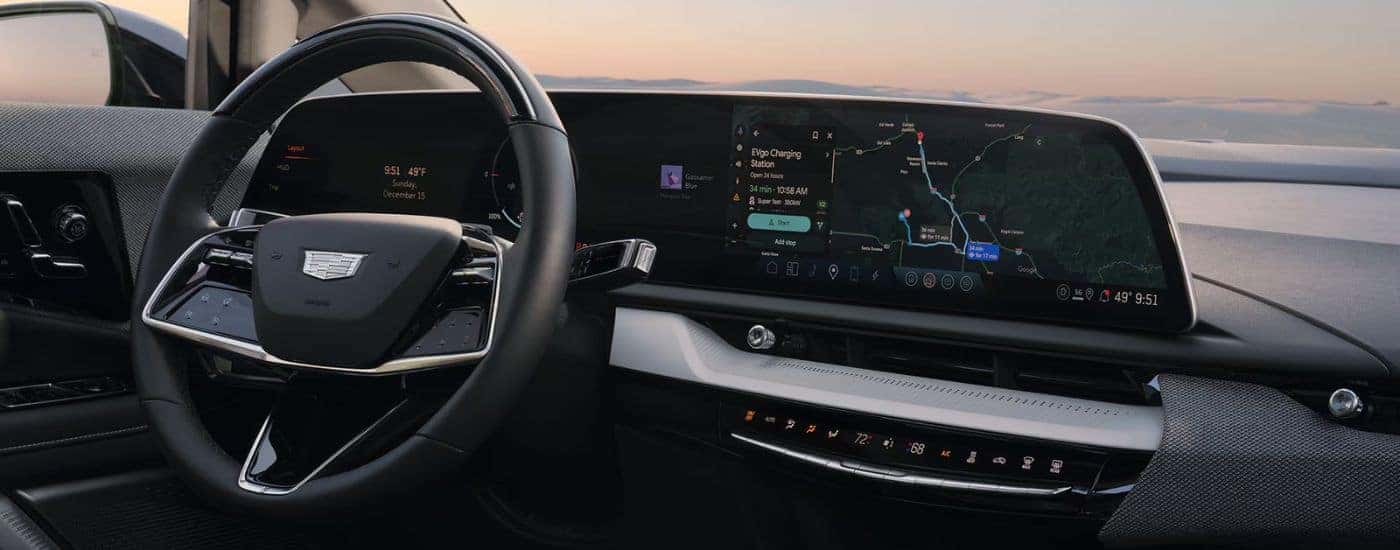 Steering wheel and infotainment display on a 2027 Cadillac OPTIQ.