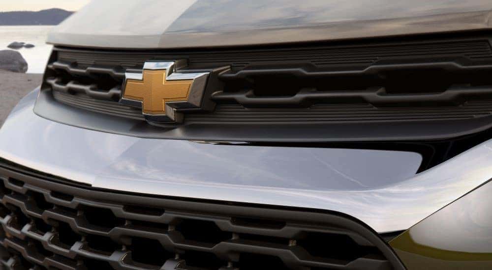 A close up shows the grille on a silver 2021 Chevy Trailblazer ACTIV.