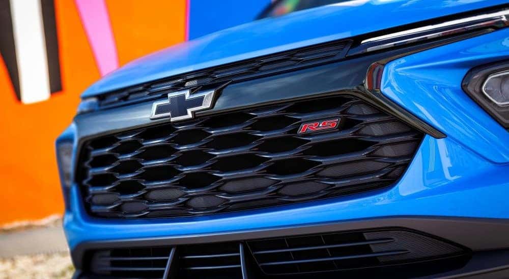 A close up shows the grille on a blue 2024 Chevy Trailblazer RS.