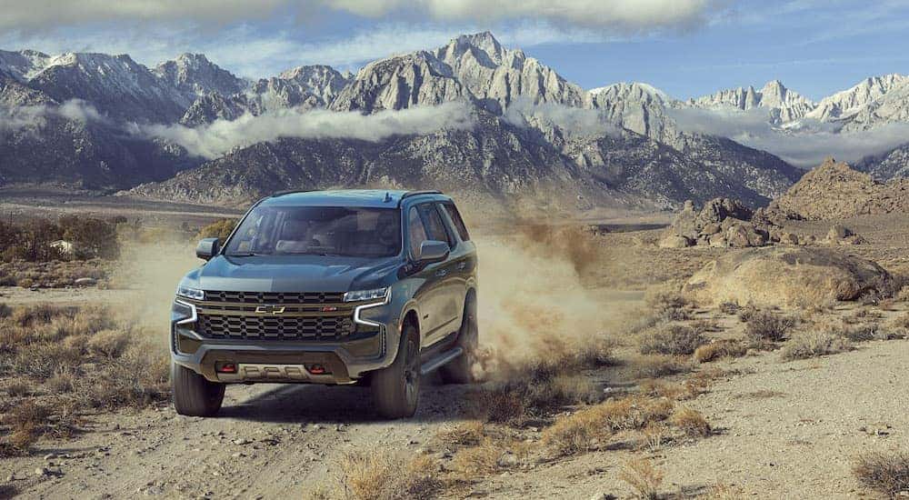 A silver 2023 Chevy Tahoe Z71 is shown from the front at an angle.