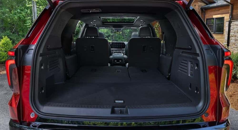 The black interior cargo area of a 2024 Chevy Traverse is shown.