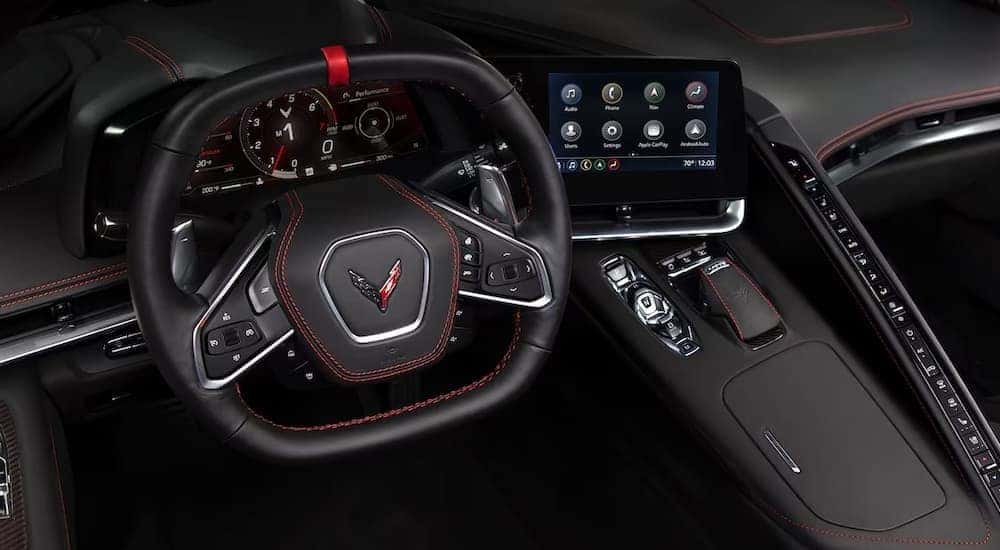 The black interior and dash in a 2024 Chevy Corvette Stingray is shown.