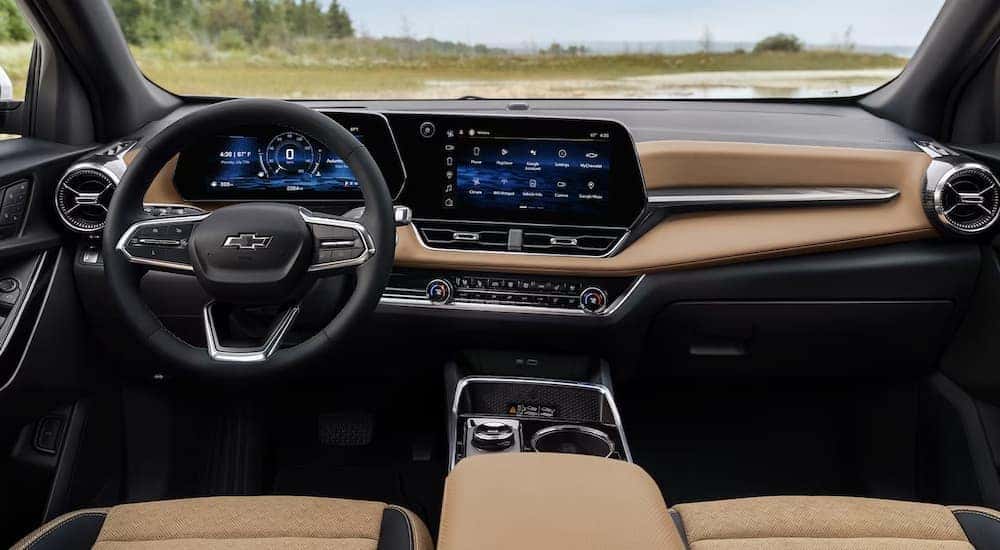 The tan and black interior of a 2025 Chevy Equinox ACTIV.