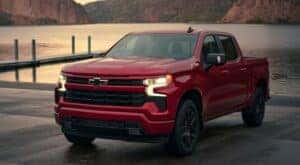 A red 2024 Chevy Silverado 1500 RST is shown parked after viewing a Chevy Silverado 1500 for sale near Alpharetta.