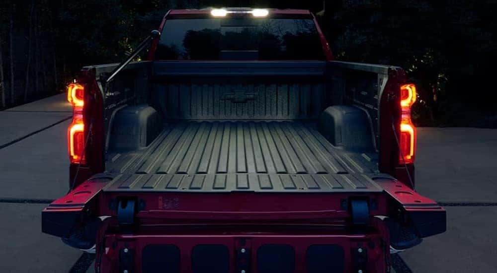 The bed of a red 2024 Chevy Silverado 1500 for sale near Sandy Springs is shown.