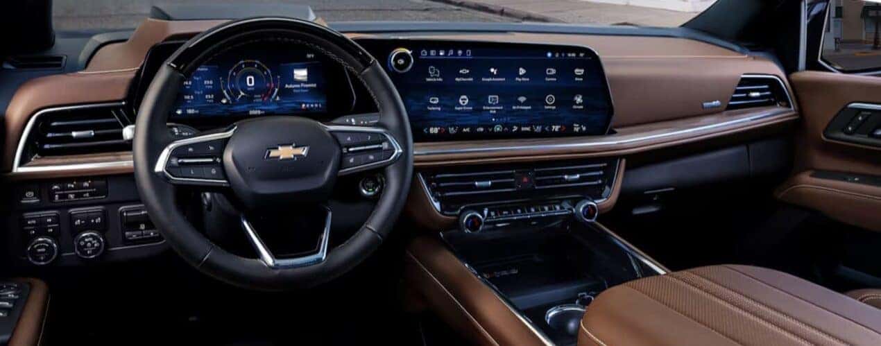 The brown interior and dash in a 2025 Chevy Tahoe is shown.