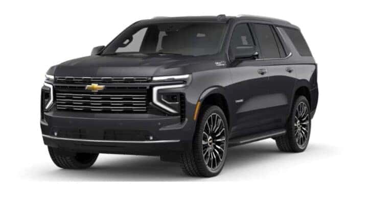 A gray 2025 Chevy Tahoe High Country is angled left.