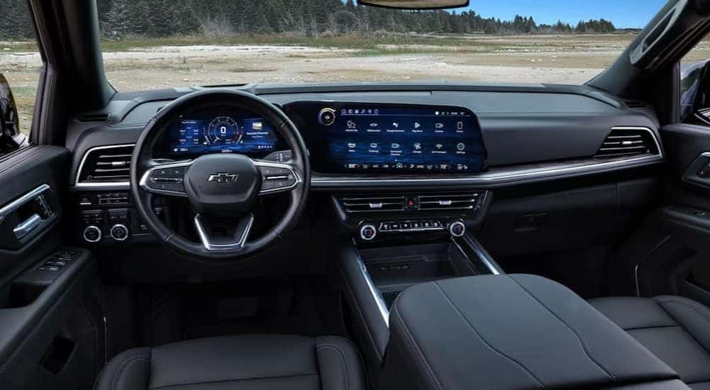 The black interior and dash in a 2025 Chevy Tahoe is shown.