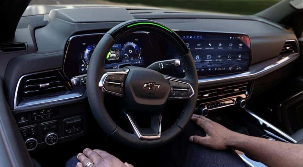 The black dash is shown in a 2025 Chevy Tahoe for sale.