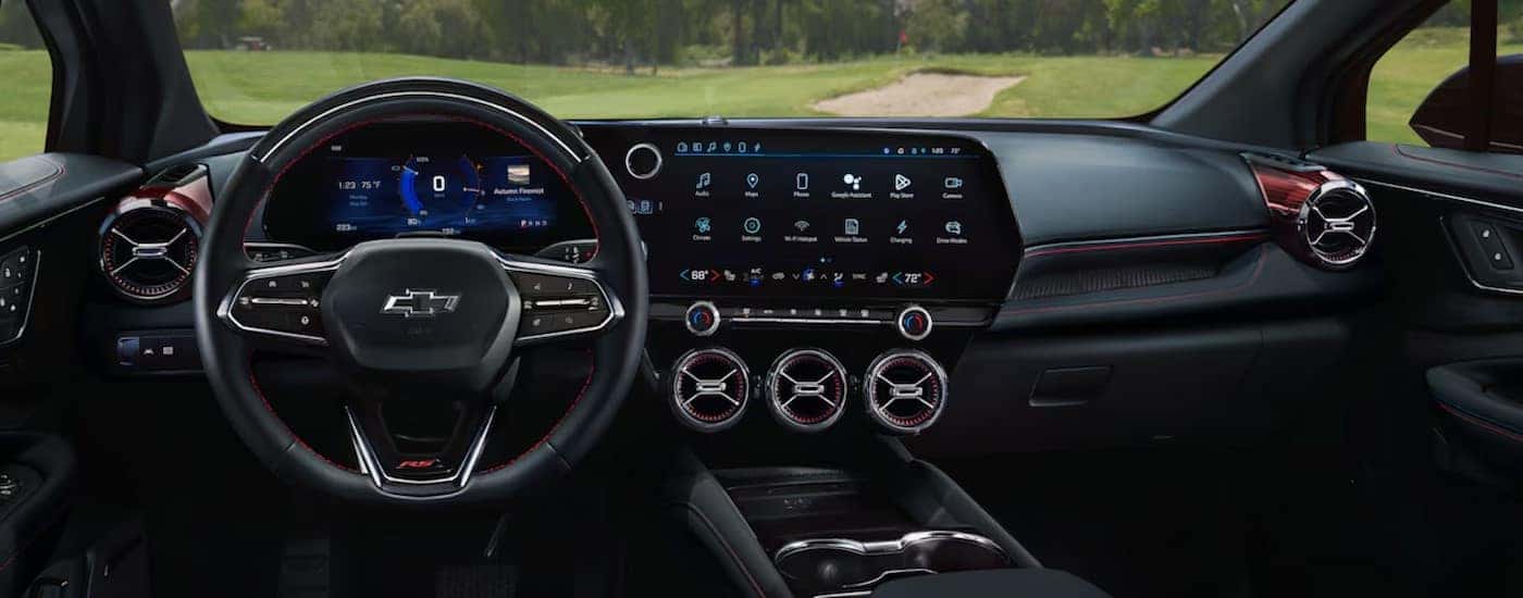 The black interior and dash in a 2025 Chevy Blazer EV is shown.