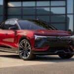A red 2024 Chevy Blazer RS is shown from the front at an angle.