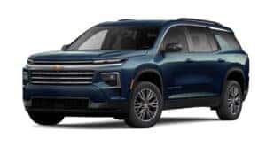 A blue 2025 Chevy Traverse is angled left.