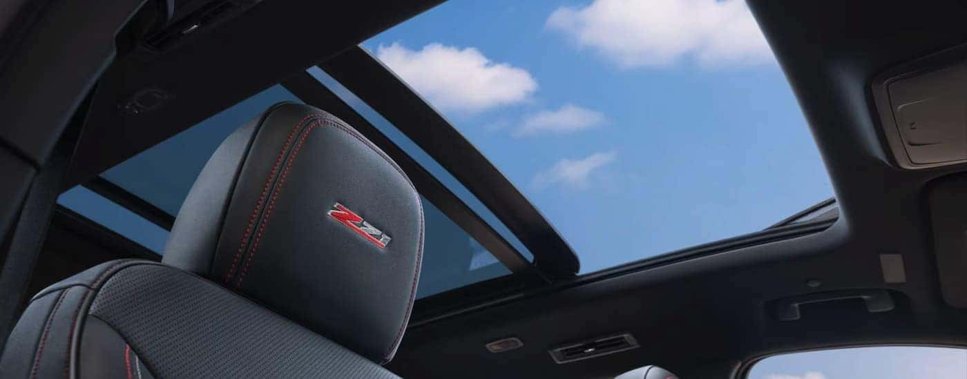 A close-up of the sunroof is shown in a 2025 Chevy Traverse Z71.