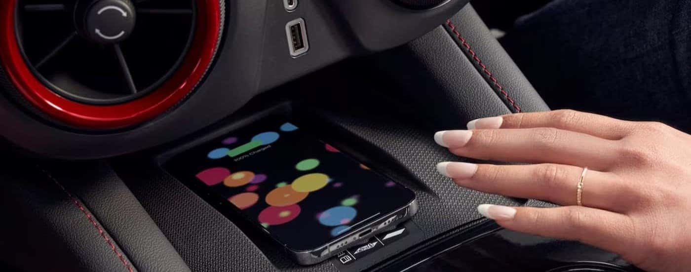 A cellphone is charging in a 2025 Chevy Blazer RS.