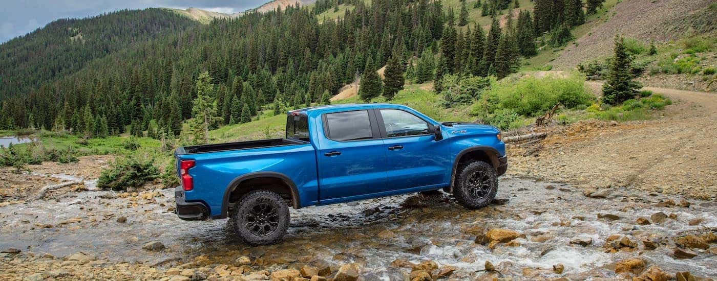 A blue 2025 Chevy Silverado 1500 ZR2 is shown from the side after leaving a Chevy dealer near Snellville.