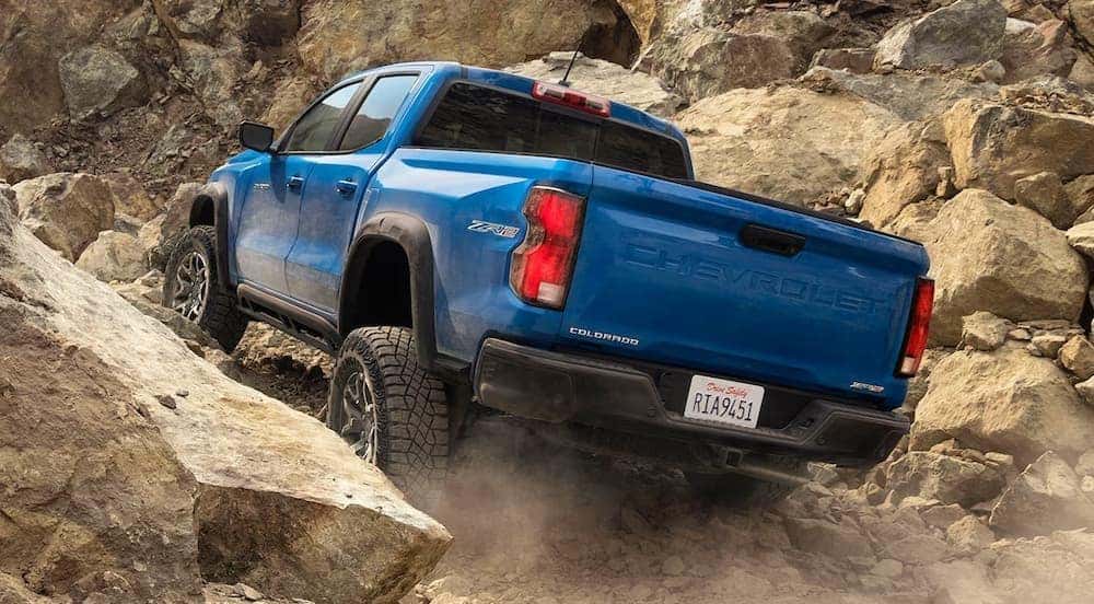 A blue 2025 Chevy Colorado ZR2 off-roading.