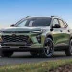 A green 2025 Chevy Trax ACTIV parked on a road