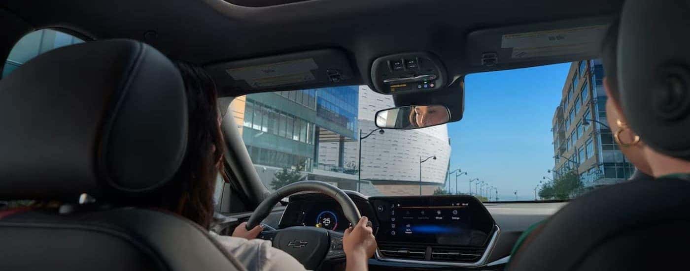 People driving in a 2025 Chevy Trax for sale in Atlanta.