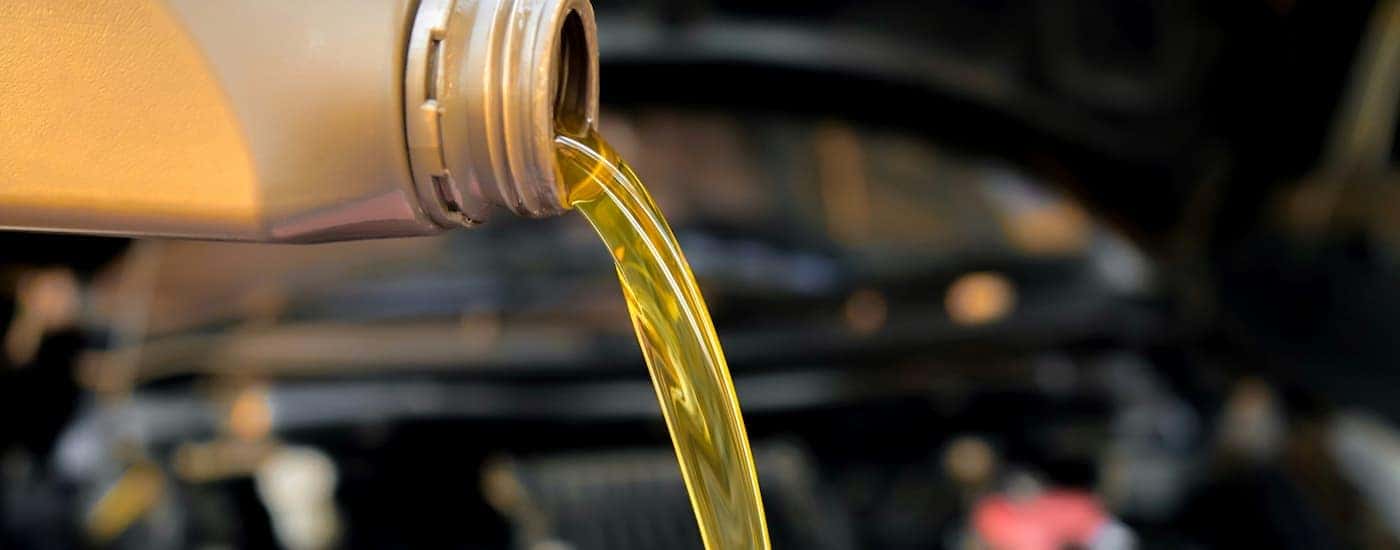 Close-up of an oil can being poured out.