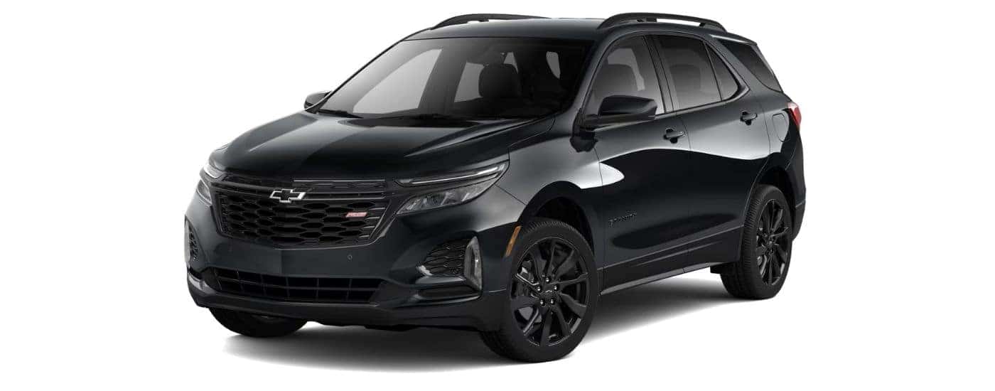 A black 2024 Chevy Equinox RS is angled left.