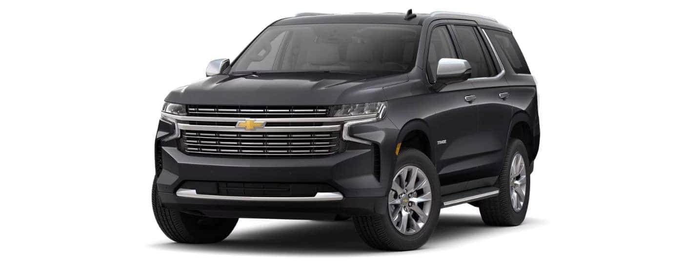 A black 2023 Chevy Tahoe Premier is angled left.