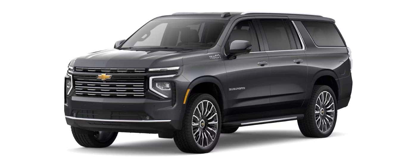 A gray 2025 Chevy Suburban High Country angled left.
