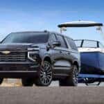 A black 2025 Chevy Suburban from the front.