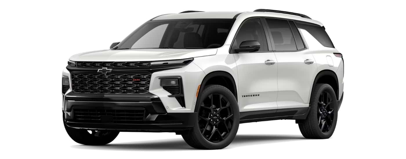 A white 2025 Chevy Traverse RS angled left.