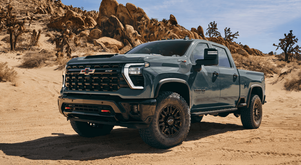 Green 2026 Chevy Silverado 2500 HD ZR2 parked off road