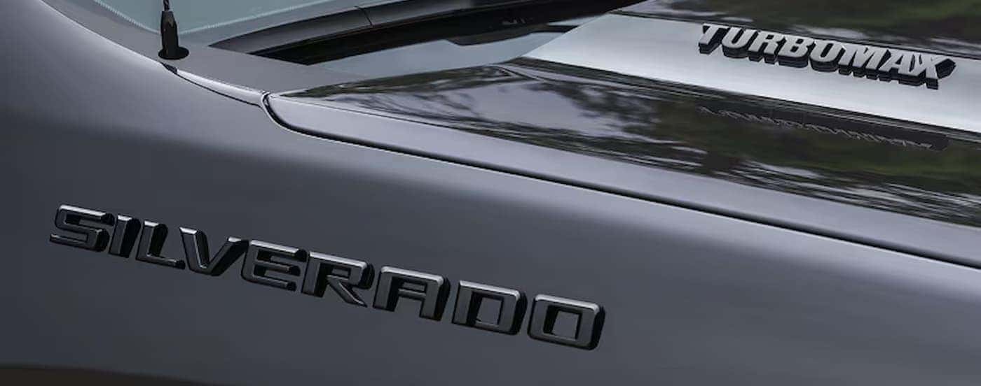 The Silverado badge on a 2026 Chevy Silverado 1500 for sale near Marietta.