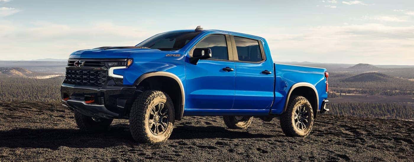 A blue 2025 Chevy Silverado 1500 parked for sale near Johns Creek