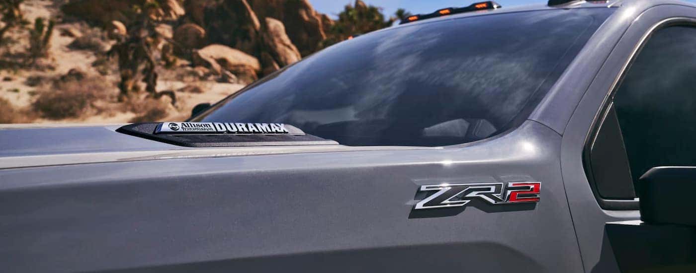 Close-up of the hood on a gray 2026 Chevy Silverado 2500 HD ZR2