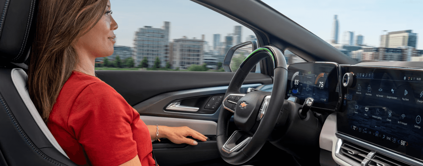A person using the Super Cruise feature in a 2026 Chevy Equinox EV