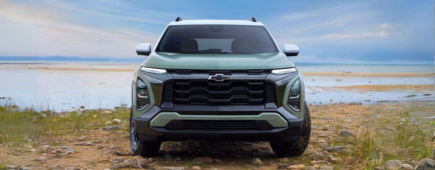 A light green 2025 Chevy Equinox shown from the front.