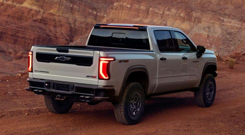 A gray 2027 Chevy Silverado 1500 ZR2 shown parked in a canyon rear-facing.