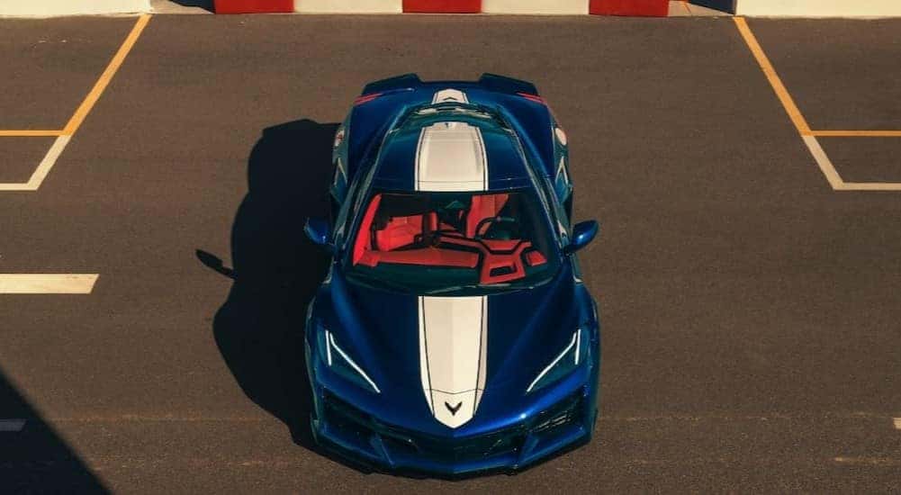 Aerial view of a blue and white 2027 Corvette Grand Sport 3LT Coupe.