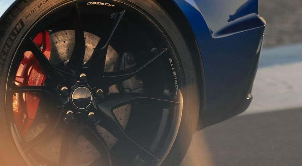 A wheel on a blue 2027 Corvette Grand Sport 3LT Coupe.