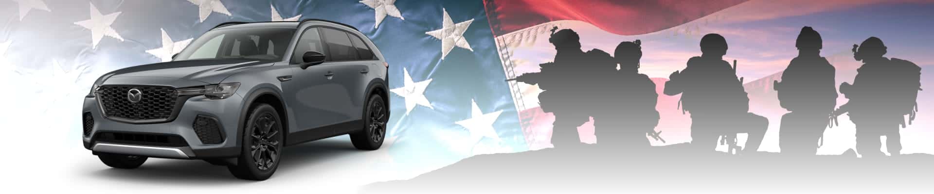 Gray Mazda SUV with American flag and military silhouettes in the background.