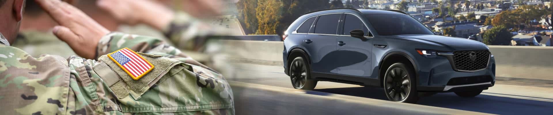 Gray Mazda SUV driving beside a close-up of a military uniform with an American flag patch.